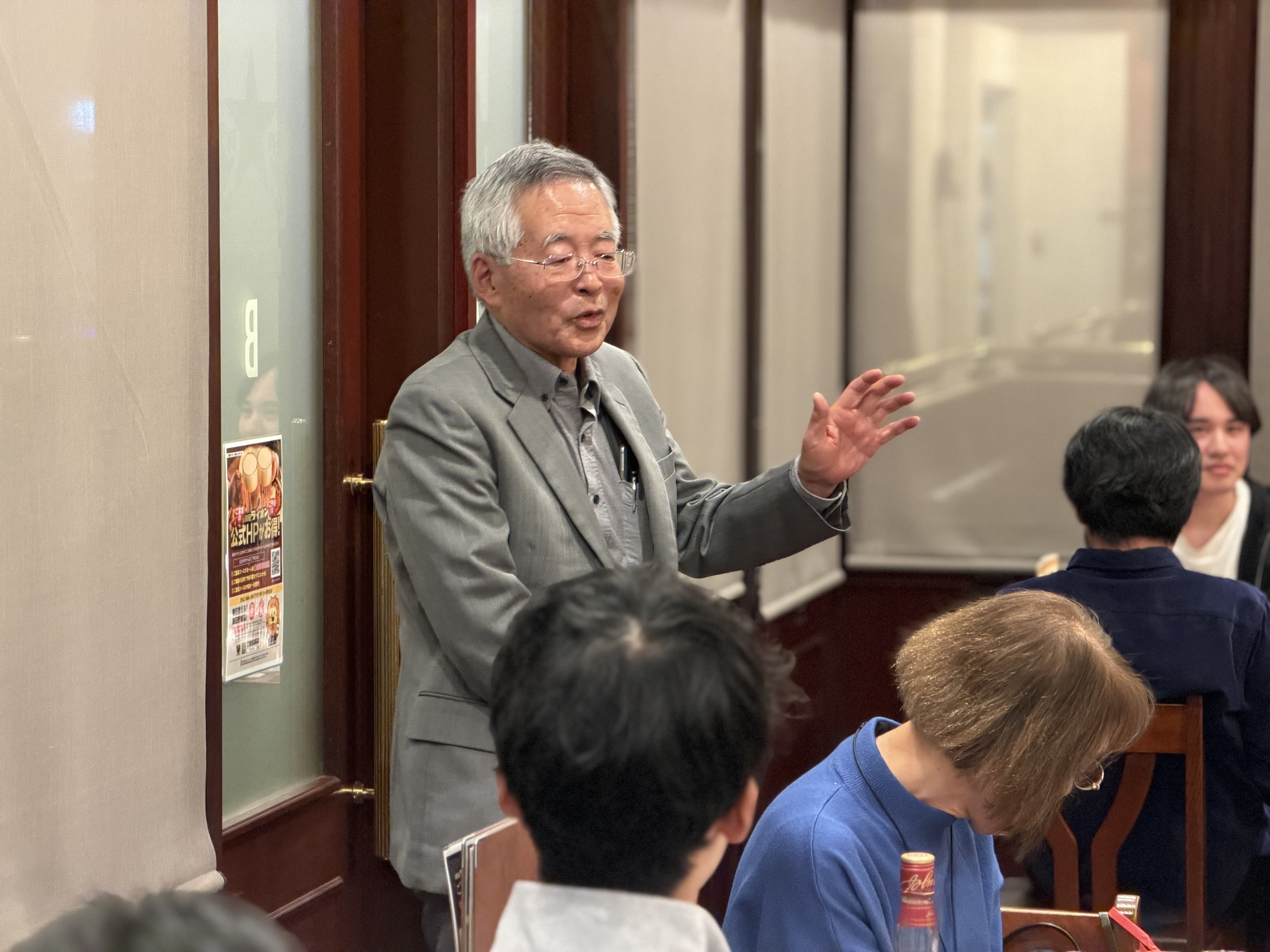 青雲会会長によるスピーチの様子